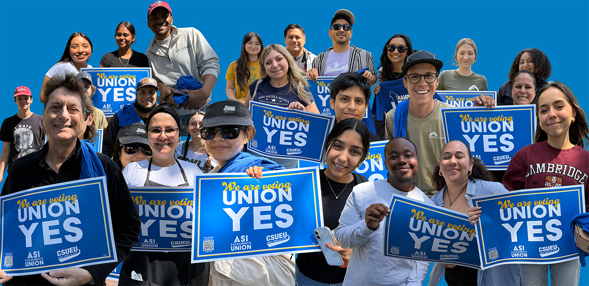 ASI Sacramento workers holding union yes signs